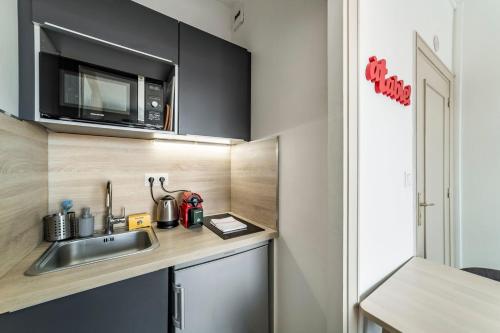 AllinLyon | Studio vue toits Presqu’île