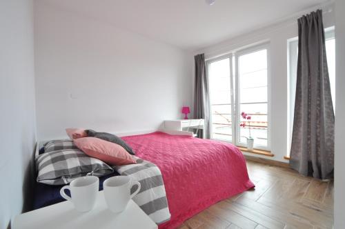 Pokoje AQUA na poddaszu