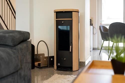 Ferienwohnung Seehus - Modernes Ferienhaus mit Sauna, Seezugang und Bootsanlegeplatzにあるシーティングエリア