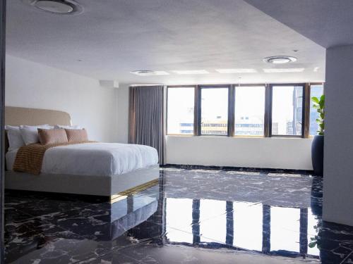 Katil atau katil-katil dalam bilik di Pent Lucius - 3 bedroom Penthouse