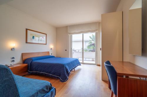 Postel nebo postele na pokoji v ubytování Verdeluna ApartHotel