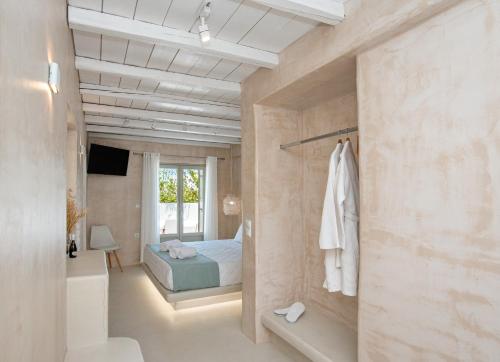 Postel nebo postele na pokoji v ubytování Moustakas Beach Apartments
