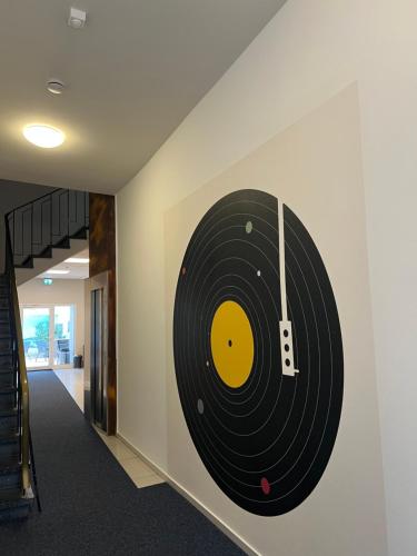 a vinyl record on a wall in a hallway at Hotel Capri in Überlingen
