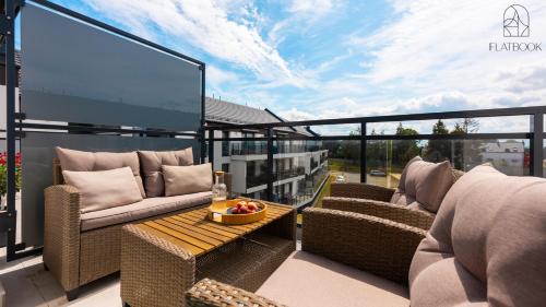 Balkón nebo terasa v ubytování Jantar Resort Flatbook - Wynajem Apartamentów nad Morzem