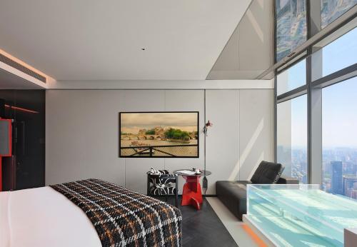 Cama o camas de una habitación en ISEYA Panoramic Hotel Changsha Wuyi Square Flagship