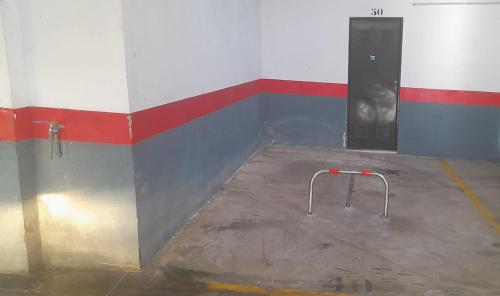 a room with a blue and red wall and a door at Chill & Shine - Sun and Relax in Benalmádena