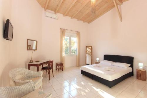 Postel nebo postele na pokoji v ubytování Villa Nayas