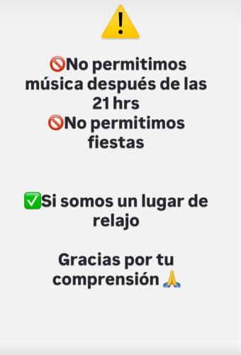 a screenshot of a cell phone with the words no permitizesussia desumes at Beehouse Withe Jacuzzi Opcional in Villa Alemana