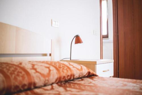 Кровать или кровати в номере Hotel Ristorante Mira Conero