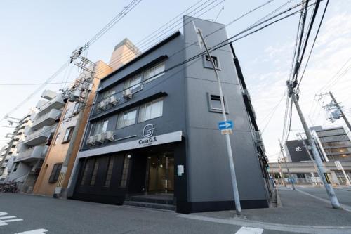 a building on the corner of a street at Casa G,S, - Vacation STAY 53485v in Osaka