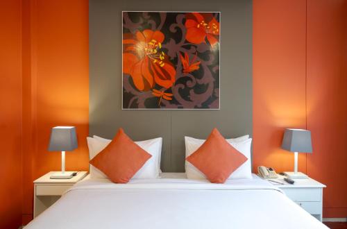 Postel nebo postele na pokoji v ubytování Memoire Siem Reap Hotel