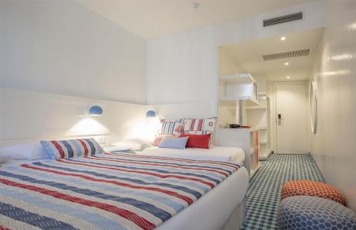Postel nebo postele na pokoji v ubytování Amadria Park Kids Hotel Andrija