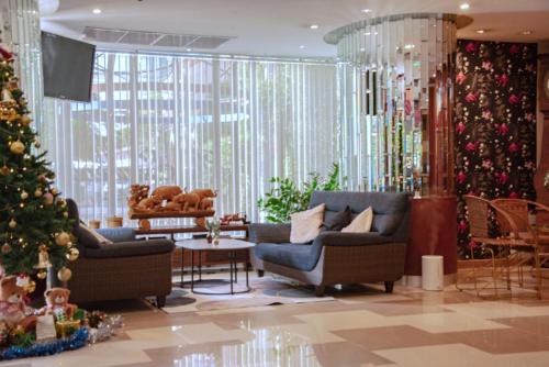 Χώρος καθιστικού στο The Sunreno Hotel Bangkok
