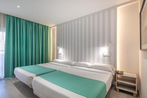Poseidon Resortにあるベッド