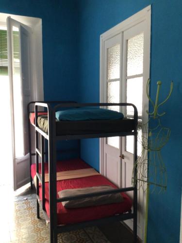 Katil atau katil-katil dalam bilik di Tarragona Rooms