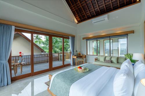 Voodi või voodid majutusasutuse Jati Ubud toas
