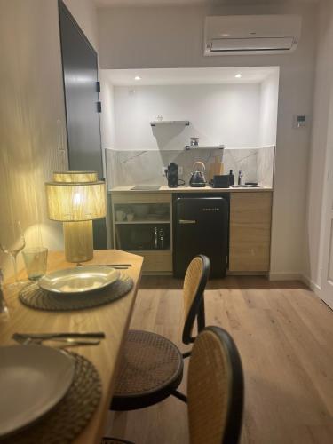Kuchyň nebo kuchyňský kout v ubytování Maison d'Hôtes Les Sources