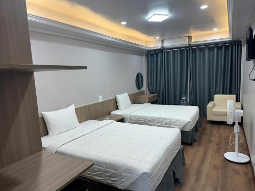 Katil atau katil-katil dalam bilik di Mekong Hotel