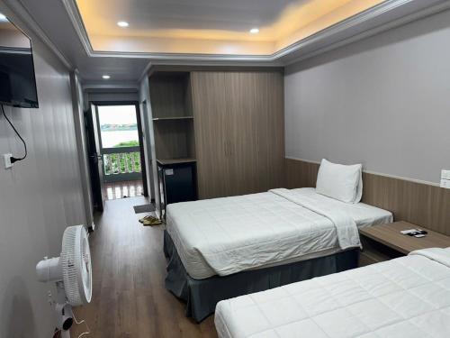 Katil atau katil-katil dalam bilik di Mekong Hotel