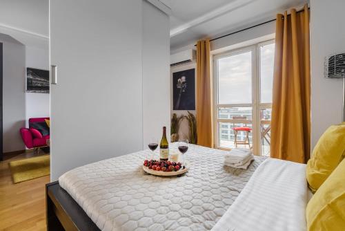 Μια τηλεόραση ή/και κέντρο ψυχαγωγίας στο Lumina cozy apartment Platinum Tower