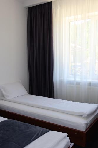 Cama o camas de una habitación en Gots - готельно-ресторанний комплекс