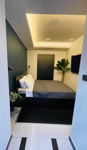 a bedroom with a large bed in a room at Knez in Belgrade