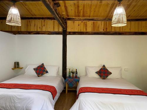 Ένα ή περισσότερα κρεβάτια σε δωμάτιο στο The Link farmstay