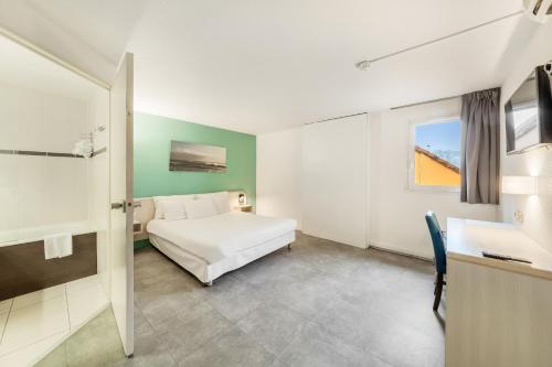 Voodi või voodid majutusasutuse Comfort Hotel Orleans Saran toas