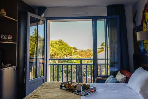 Postel nebo postele na pokoji v ubytování Domaine Les Clayères