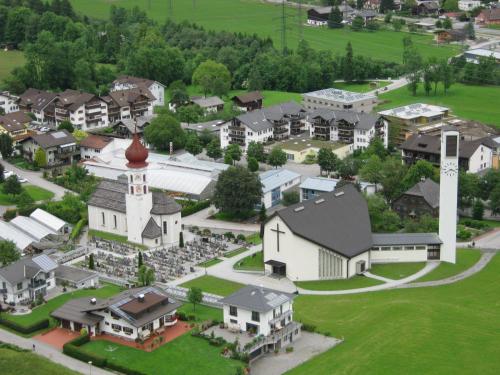 an aerial view of a small town with a church at Haus Zudrell in Vandans