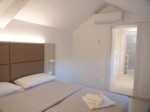 Postel nebo postele na pokoji v ubytování Hotel Castrum