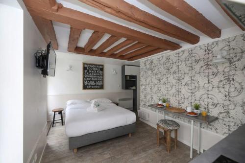 Studio parisien 20m2 en face du musee Grevin - 2P