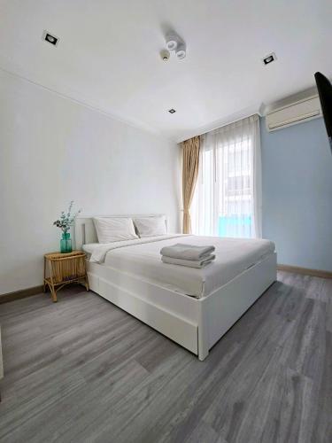 Ένα ή περισσότερα κρεβάτια σε δωμάτιο στο My Resort Condo with Pool View near Hua Hin Beach