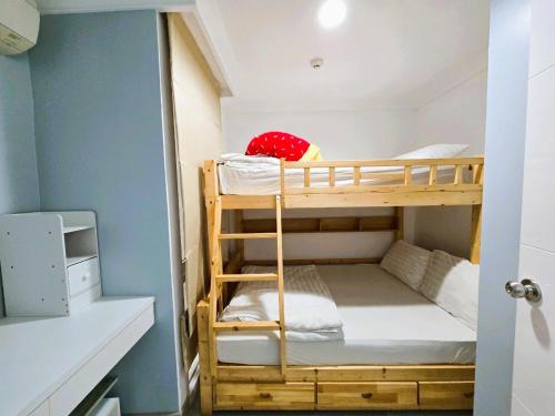 Ένα ή περισσότερα κρεβάτια σε δωμάτιο στο My Resort Condo with Pool View near Hua Hin Beach