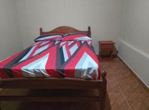 Ένα ή περισσότερα κρεβάτια σε δωμάτιο στο Inti Pacha habitaciones