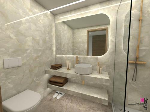 a bathroom with a toilet and a sink and a shower at Great Athens Hotel in Athens