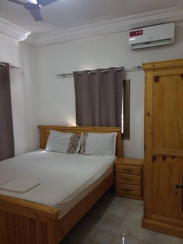 Ένα ή περισσότερα κρεβάτια σε δωμάτιο στο 9 star Apartment