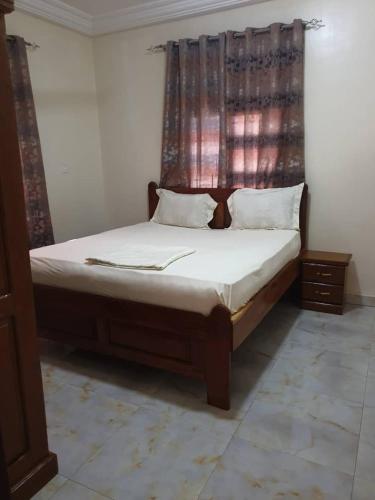 Ένα ή περισσότερα κρεβάτια σε δωμάτιο στο 9 star Apartment