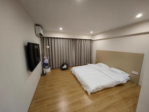 屋顶民宿 객실 침대