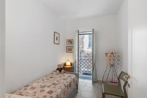 Ένα ή περισσότερα κρεβάτια σε δωμάτιο στο Villa sole e mare