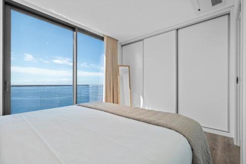 Ένα ή περισσότερα κρεβάτια σε δωμάτιο στο Atlantis Apartment