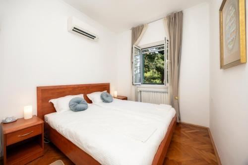 Llit o llits en una habitació de Villa Mediteran