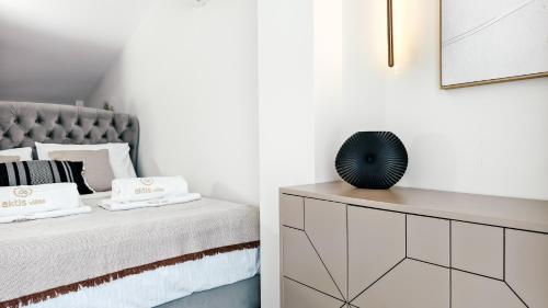 Katil atau katil-katil dalam bilik di Windfall Luxury House