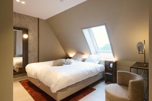 Postel nebo postele na pokoji v ubytování Scape Residences