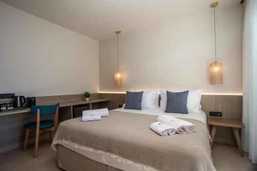 Кровать или кровати в номере Este Elegant Suites & Villas