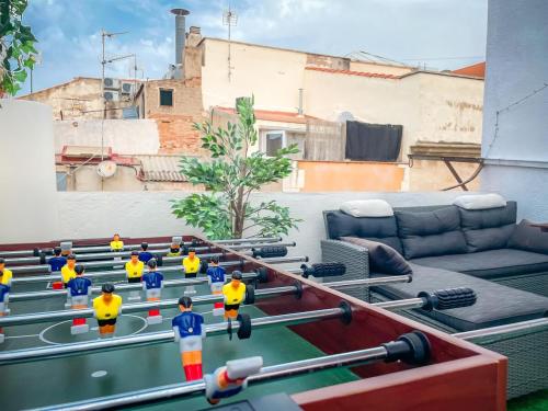 a group of lego people in a living room at Major by Unik Vacation in Tarragona