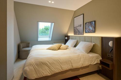 Postel nebo postele na pokoji v ubytování Scape Residences