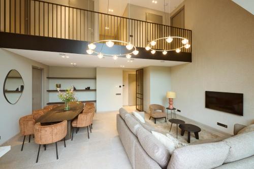 TV a/nebo společenská místnost v ubytování Scape Residences
