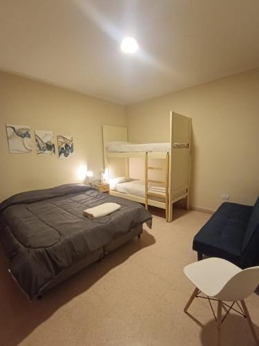 Postel nebo postele na pokoji v ubytování Privilegio Hostel