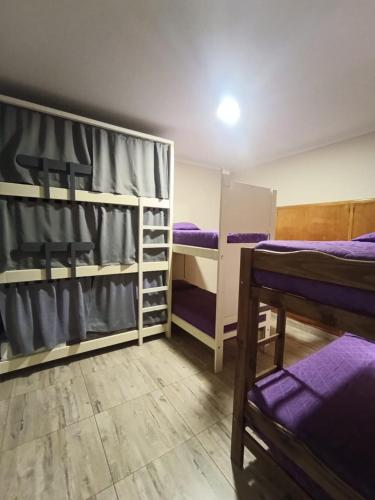 Postel nebo postele na pokoji v ubytování Privilegio Hostel